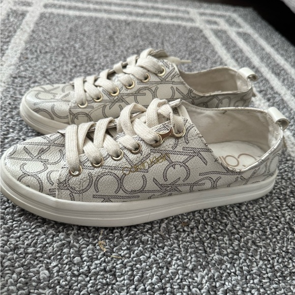 Calvin Klein Shoes - Women's Calvin Klein White And Black Ck Logo Sneakers